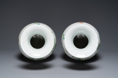 A pair of Chinese famille rose vases with floral design, Qianlong mark, 19/20th C.