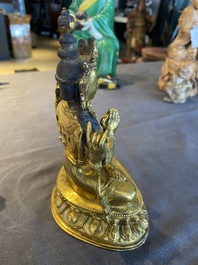 A Chinese gilt bronze figure of Avalokitesvara, Yongzheng mark and of the period