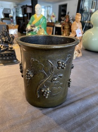 A Chinese bronze 'squirrel on grapevine' brush pot, Qianlong mark, 18/19th C.