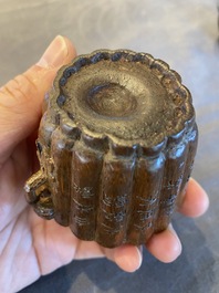 A Chinese carved bamboo cup with inscribed poem, 18th C.