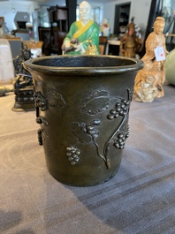 A Chinese bronze 'squirrel on grapevine' brush pot, Qianlong mark, 18/19th C.