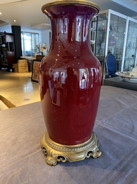 A Chinese flamb&eacute;-glazed vase with gilt bronze mounts, 19th C.