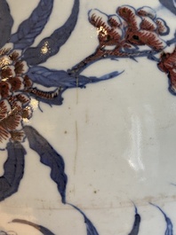 A Chinese blue, white and copper-red 'nine peaches' bottle vase, Guangxu mark and of the period