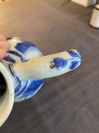 A Chinese blue and white ewer with figures in a landscape, Transitional period