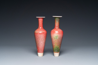 A pair of Chinese peachbloom-glazed vases on wooden stands, Kangxi mark, 19th C.