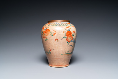 A Japanese Hizen Kakiemon-style vase with copper rim, Edo, 18th C.