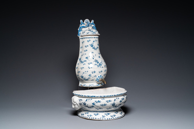 A blue and white Brussels faience fountain with basin, 18th C.