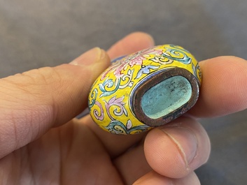 A Chinese Canton enamel snuff bottle and a pair of bone snuff bottles, 19th C.