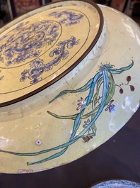 A Chinese Canton enamel dish with a European tea scene and one with ladies and boys, 18/19th C.