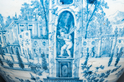 A large Dutch Delft blue and white vase depicting a country house, 1st quarter 18th C.