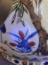 A Chinese wucai garlic-mouth bottle vase, Wanli mark and of the period