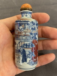 A Chinese blue, white and copper-red snuff bottle, 19th C.