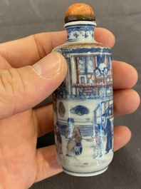 A Chinese blue, white and copper-red snuff bottle, 19th C.