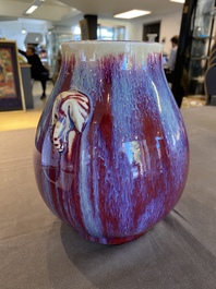 A Chinese flamb&eacute;-glazed 'hu' vase, 19/20th C.