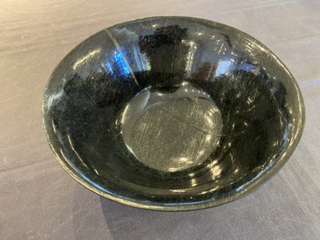 A Chinese dark moss green jade bowl, Qing