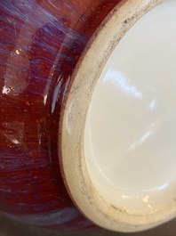 A Chinese flamb&eacute;-glazed 'hu' vase, 19/20th C.