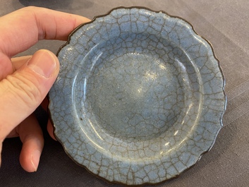 A small Chinese black-glazed double gourd vase and a blue crackle-glazed saucer dish, Qing