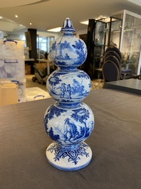 An exceptional Dutch Delft blue and white triple gourd money bank, early 18th C.