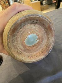 A Chinese Longquan celadon vase with underglaze design, Yuan or later