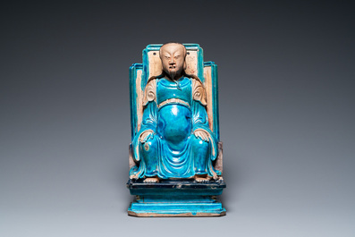 A Chinese fahua-glazed biscuit figure of Zhenwu, Ming