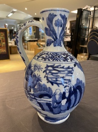 A Japanese blue and white jug with figures in a landscape, Edo, 17th C.