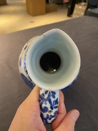 A Japanese blue and white jug with figures in a landscape, Edo, 17th C.