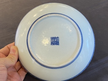 A Chinese blue, white and underglaze red dish, Qianlong mark, 19/20th C.