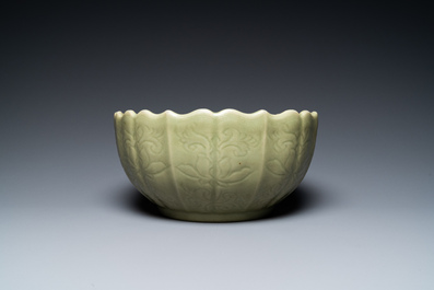 A large Chinese Longquan celadon bowl with underglaze lotus design, Ming