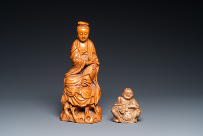 A Chinese carved wood Guanyin and a soapstone carving of Liu Hai, Qing