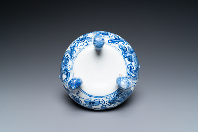 A Chinese blue and white 'mythical beasts' tripod censer, 19th C.