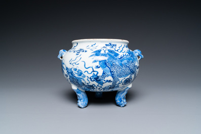 A Chinese blue and white 'mythical beasts' tripod censer, 19th C.