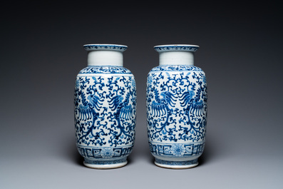 A pair of Chinese blue and white 'phoenix' vases, Kangxi mark, 19th C.