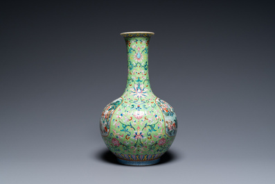 A Chinese famille rose lime green-ground '100 boys' vase, Jiaqing mark and of the period