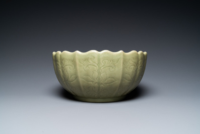 A large Chinese Longquan celadon bowl with underglaze lotus design, Ming