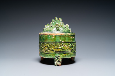 A Chinese green-glazed 'mountain' censer and cover, Eastern Han Dynasty