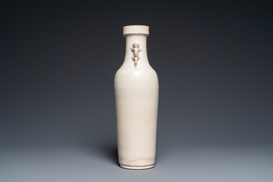 A Chinese monochrome Swatow vase with dragon handles, Transitional period