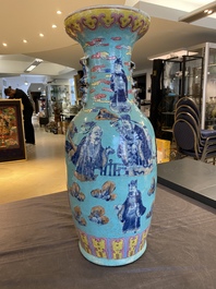 A Chinese famille rose turquoise-ground 'immortals' vase, 19th C.