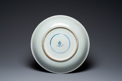 A Chinese famille verte dish with a lady and two playing boys, Kangxi