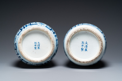 A pair of Chinese blue and white 'phoenix' vases, Kangxi mark, 19th C.