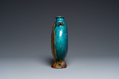 A Chinese fahua 'moonflask' with applied lotus design, Ming