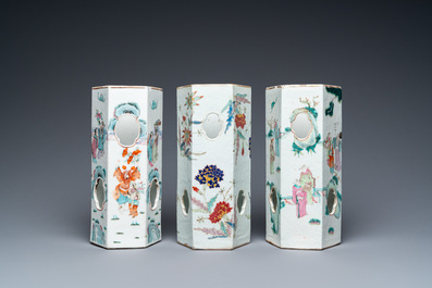 Three Chinese famille rose reticulated hexagonal hat stands, 19th C.