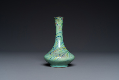 A Chinese swirled blue, yellow and turquoise-glazed bottle vase, Qianlong