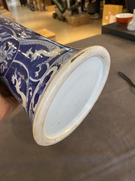 A pair of Chinese blue and white vases with dragons, 19th C.