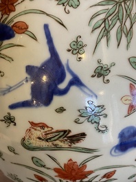 A Chinese wucai garlic-mouth bottle vase, Wanli mark and of the period