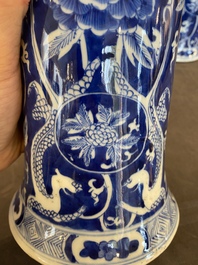 A pair of Chinese blue and white vases with dragons, 19th C.