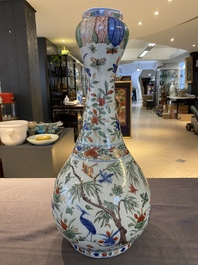 A Chinese wucai garlic-mouth bottle vase, Wanli mark and of the period