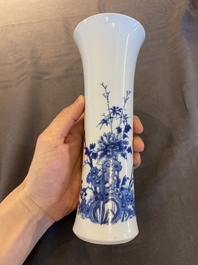 A Chinese blue and white vase with birds in a blossoming setting, Transitional period