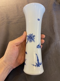 A Chinese blue and white vase with birds in a blossoming setting, Transitional period