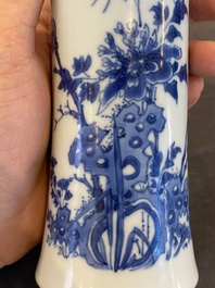 A Chinese blue and white vase with birds in a blossoming setting, Transitional period