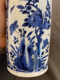 A Chinese blue and white rouleau vase with antiquities, Kangxi
